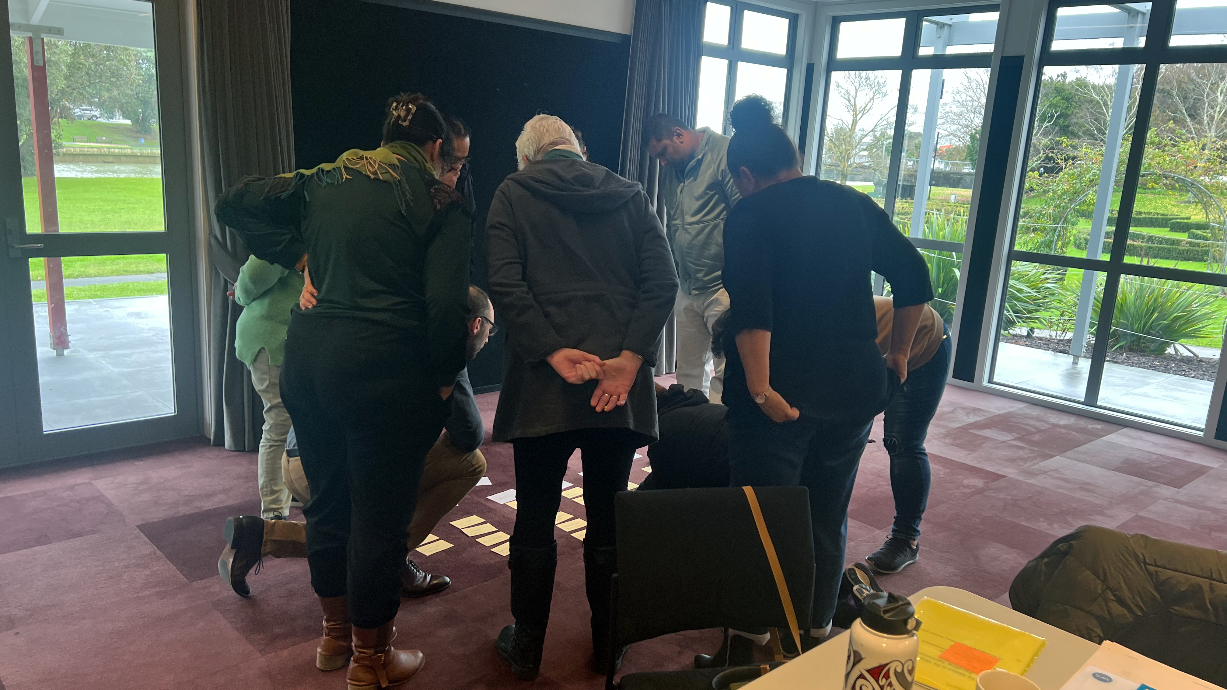 Group working through a scenario-based workshop exercise in Gisborne, New Zealand